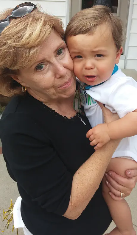 My Mom holding my son when he was a baby.